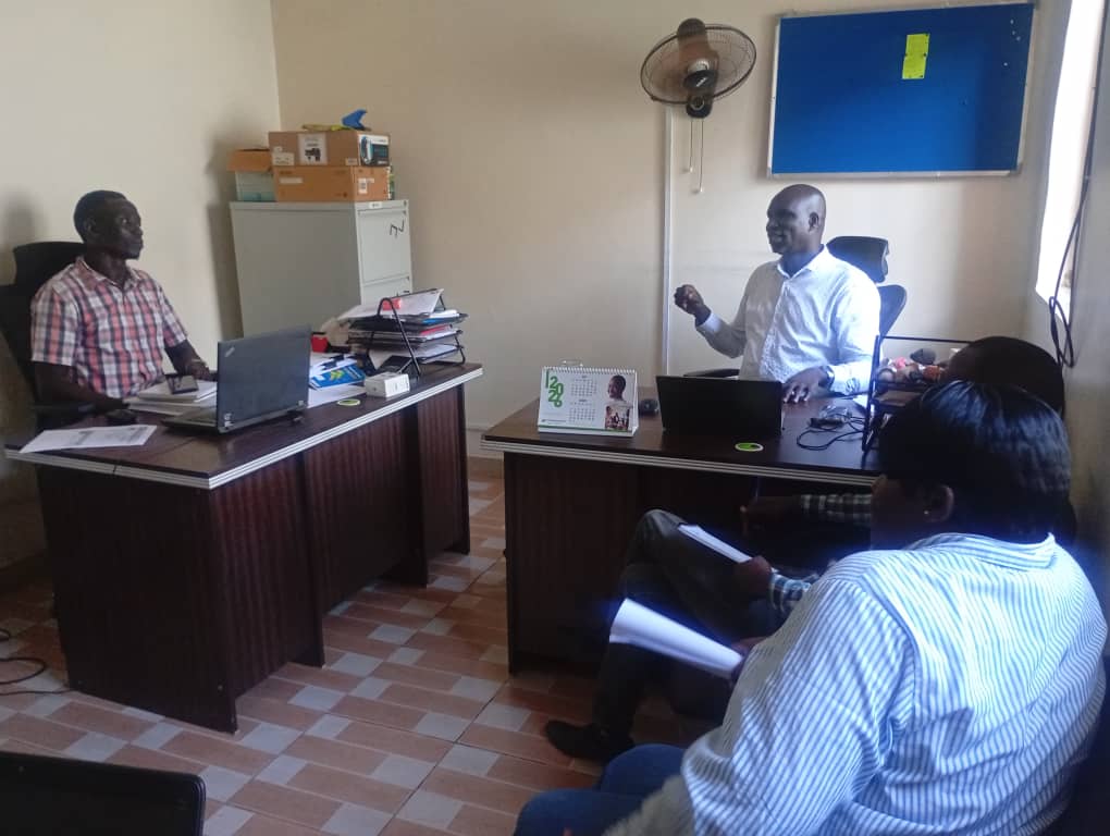 Woja Isaac Enoch, Managing Director of PRO Seed Ltd (C) in a discussion with his team | Alan
